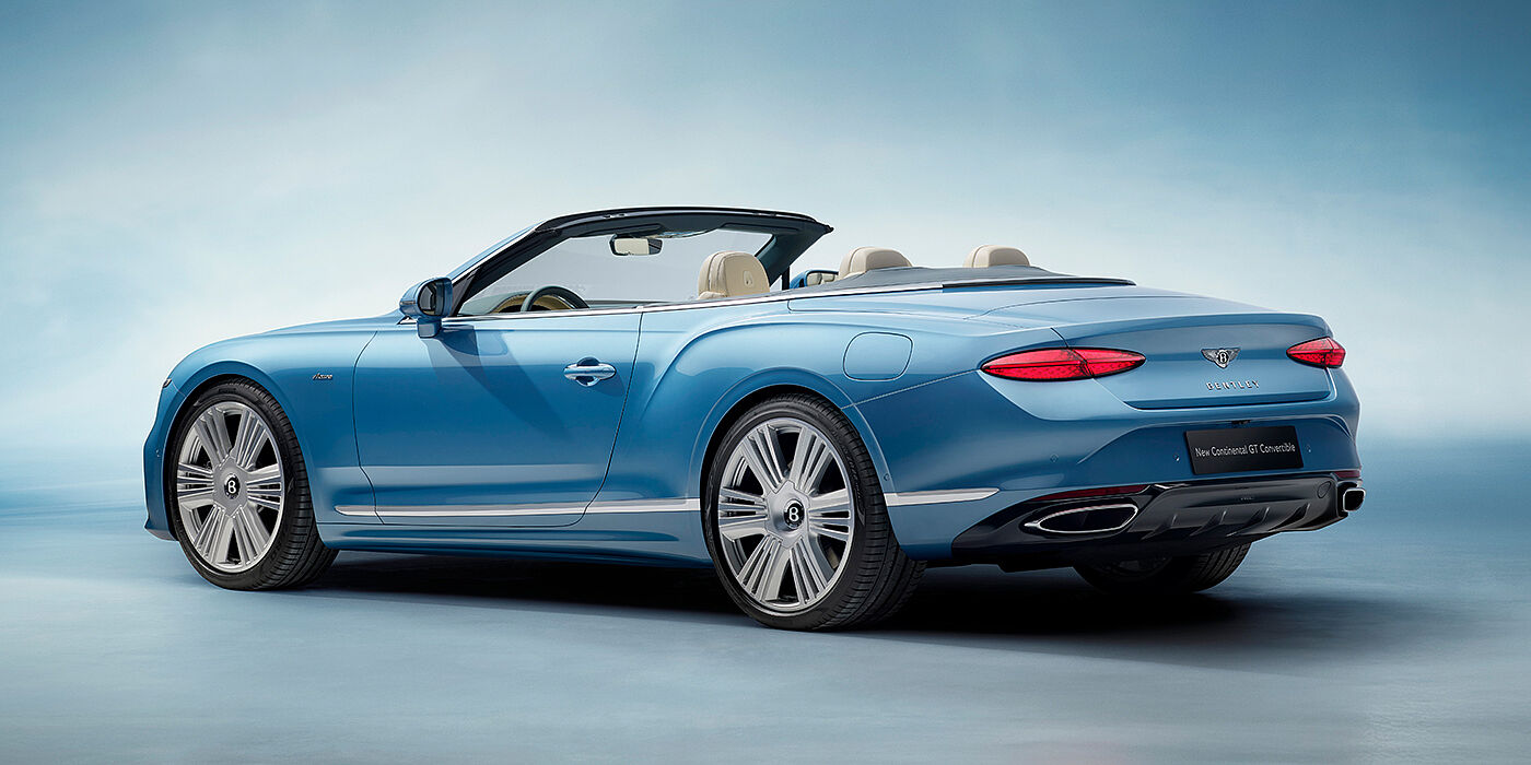 Bentley Valencia New Bentley Continental GTC Azure convertible rear view in Light Windsor blue paint with 22 inch ten spoke wheels and chrome exterior details