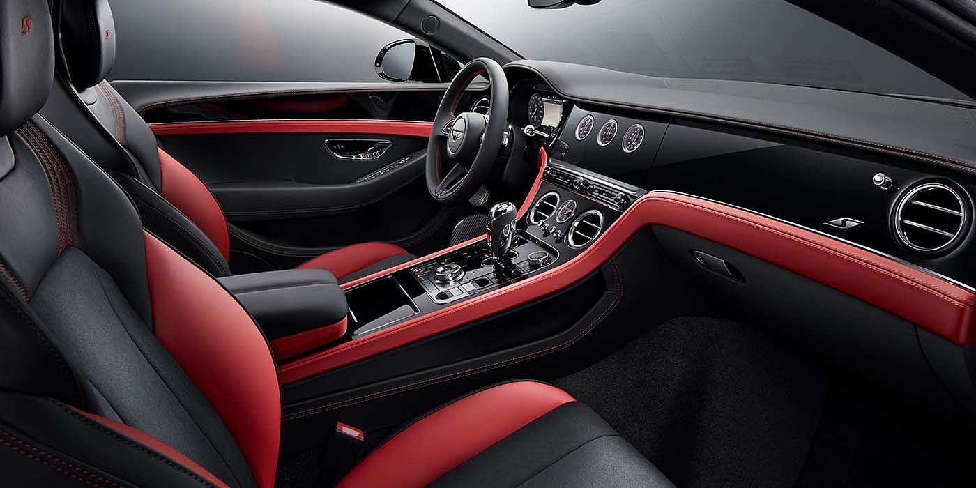 Bentley Valencia Bentley Continental GT S coupe front interior in Beluga black and Hotspur red hide with high gloss Carbon Fibre veneer