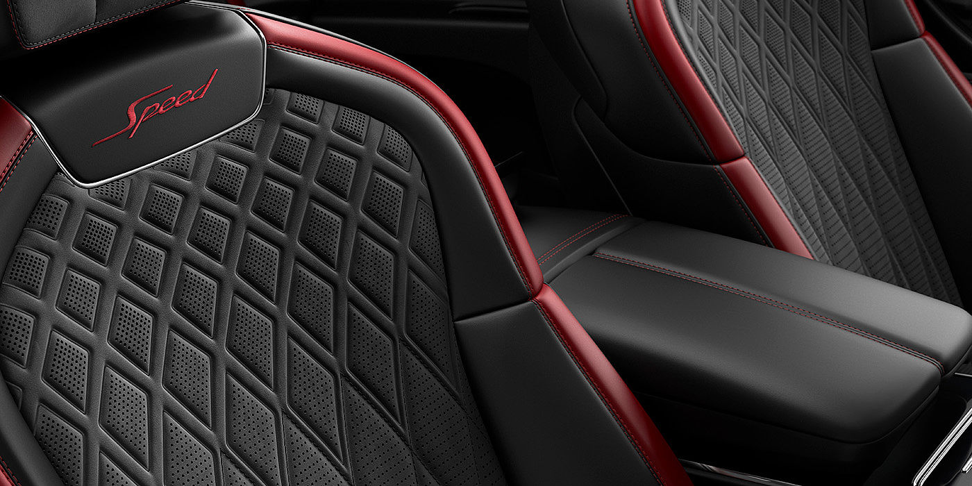 Bentley Valencia Bentley Flying Spur Speed sedan seat stitching detail in Beluga black and Cricket Ball red hide