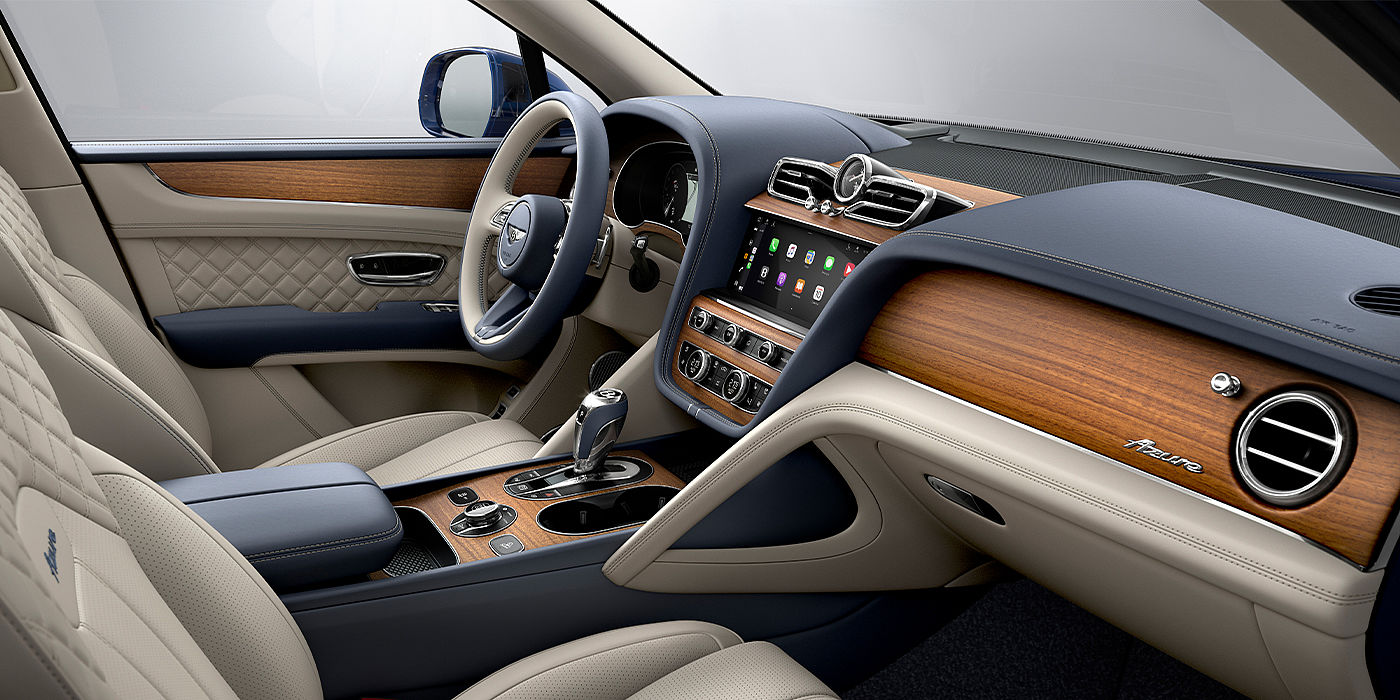 Bentley Valencia Bentley Bentayga Azure SUV front interior in Imperial Blue and Linen hide