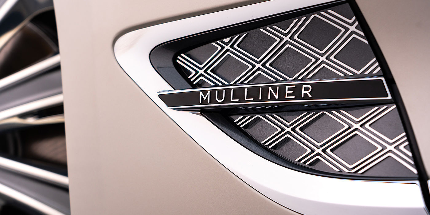 Bentley Valencia Bentley Continental GT Mulliner coupe in White Sand paint Mulliner wing vent close up