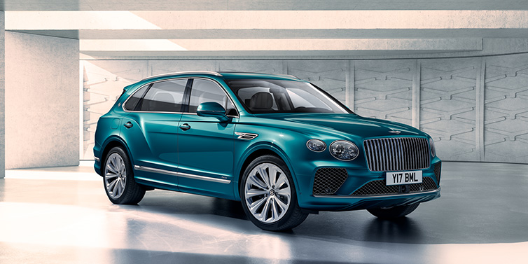 Bentley Valencia Bentley Bentayga Extended Wheelbase Azure SUV front three quarter in Topaz blue paint colour with a grey background