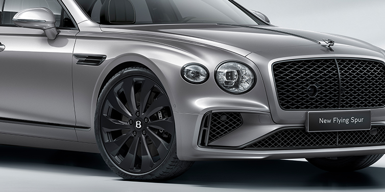 Bentley Valencia Bentley Flying Spur Speed sedan interior showing front and rear seats in Hotspur red and Gravity Grey hides, with Speed seat emblems