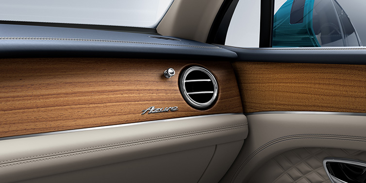 Bentley Valencia Bentley Bentayga Extended Wheelbase Azure front dash showing Open Pore Koa veneer surrounded by Portland and Imperial Blue hides