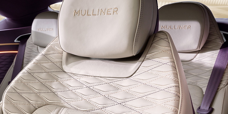 Bentley Valencia Bentley Continental GT Mulliner coupe seat detail in Linen leather with Mulliner Diamond in Diamond quilting and Mulliner embroidered seat emblem